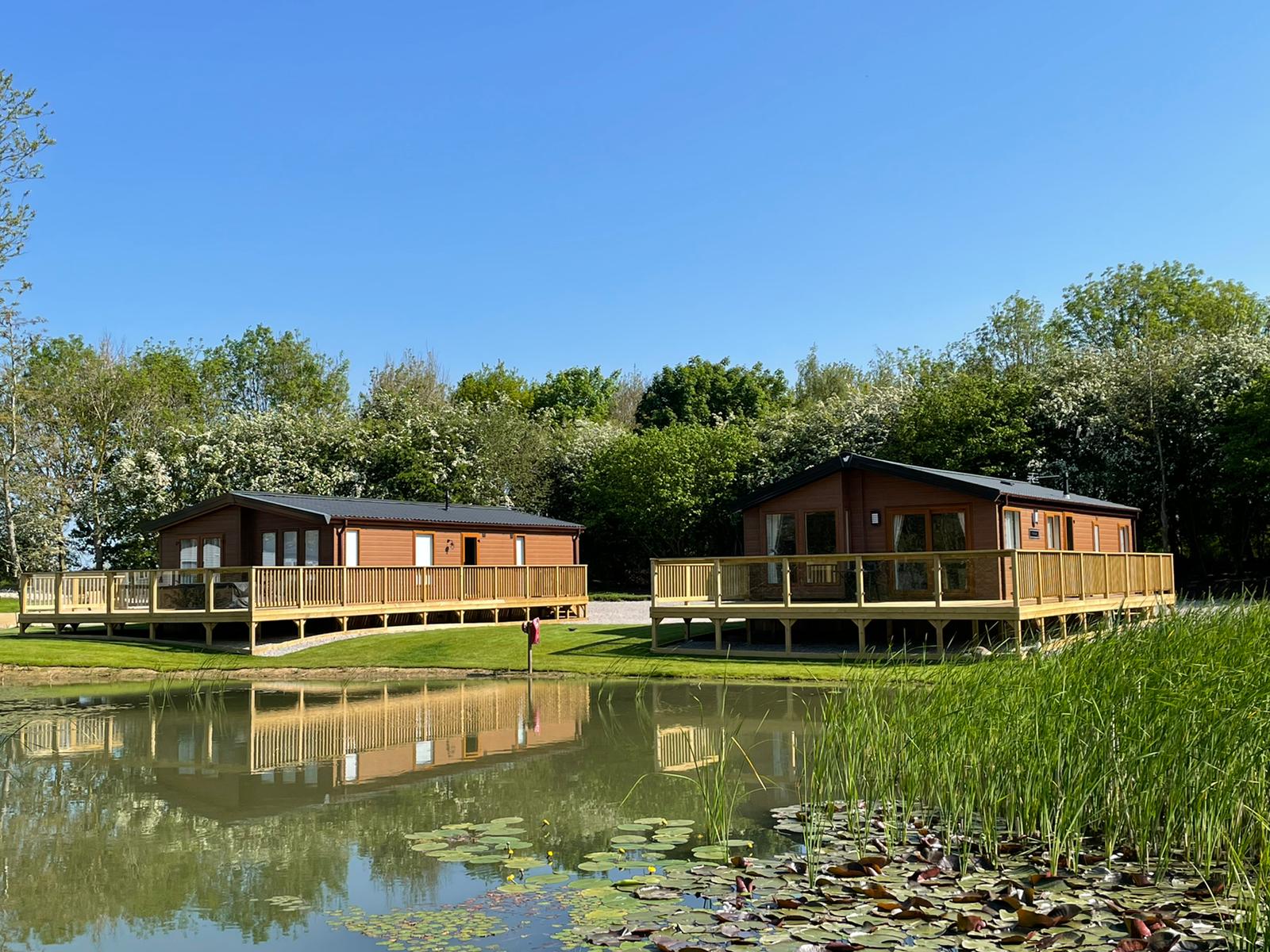 Caravans on the edge of a lake at Brickyard Lakes – the perfect spot to enjoy your North Yorkshire caravan holidays