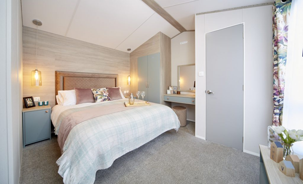 A bedroom in one of Brickyard Lakes’ holiday homes in North Yorkshire.